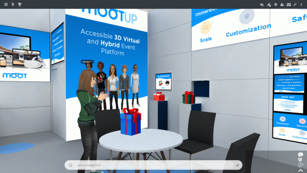 An attendee applauding beside gift boxes in MootUp